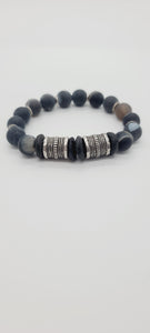 Length: 7.75 inches | Weight: 1.8 ounces  Distinctly You! This bracelet is made with 12mm dark grey spiral Agate beads, 14mm Ashanti glass rondelles, with accents of silver spacers and chrome charms.