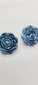 Length: 1 inch | Weight: 0.2 ounces  Distinctly You! These floral embossed post earrings are made with blue white swirl polymer clay. 