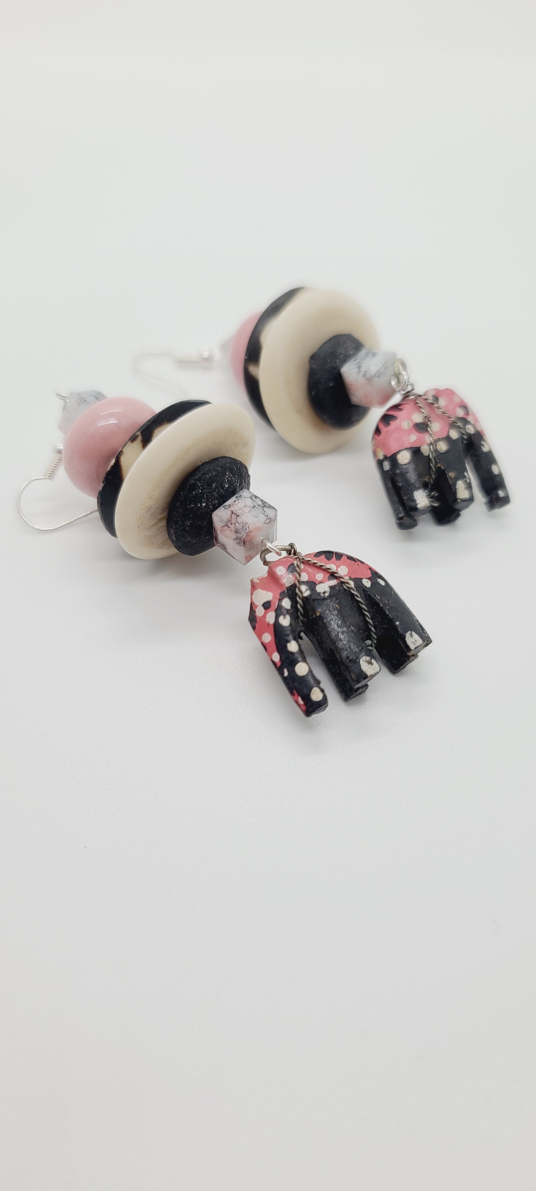 Length: 3.5 inches | Weight: 1 ounce  Distinctly You! These earrings are made with ethnic print wooden hand painted elephants, white Batik bone discs, black Ashanti glass rondelles, pink ceramic rondelles, pink and grey marble crystal cube.