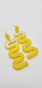 Length: 4.75 inches | Weight: 1 ounce  Distinctly You! These earrings are made with colors gold and canary yellow, 10mm yellow cracked glass beads, 10mm clear yellow glass beads, and gold rondelles.