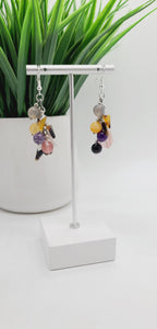 Length: 2 inches | Weight: 0.4 ounces  Distinctly You! These earrings are made with colorful semi precious stones, 8mm Onyx, Amethysts, Moonstone, Rose, Amber beads, and silver accents.