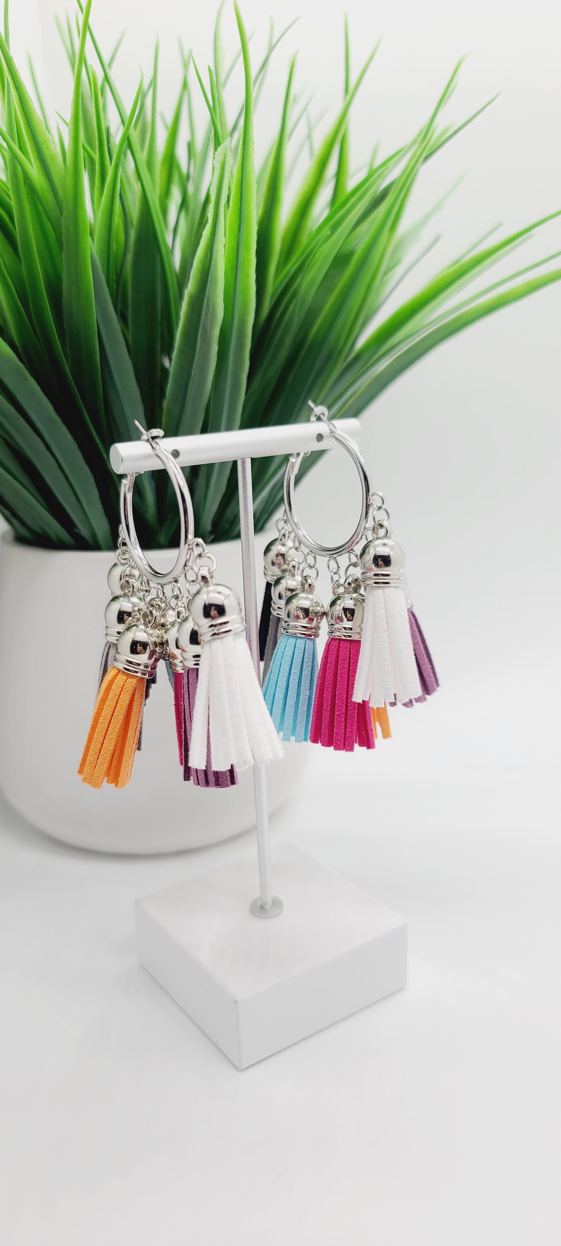 Length: 3 inches | Weight: 0.8 ounces  Distinctly You! These earrings are made with small silver hoop, five faux suede colorful tassels.