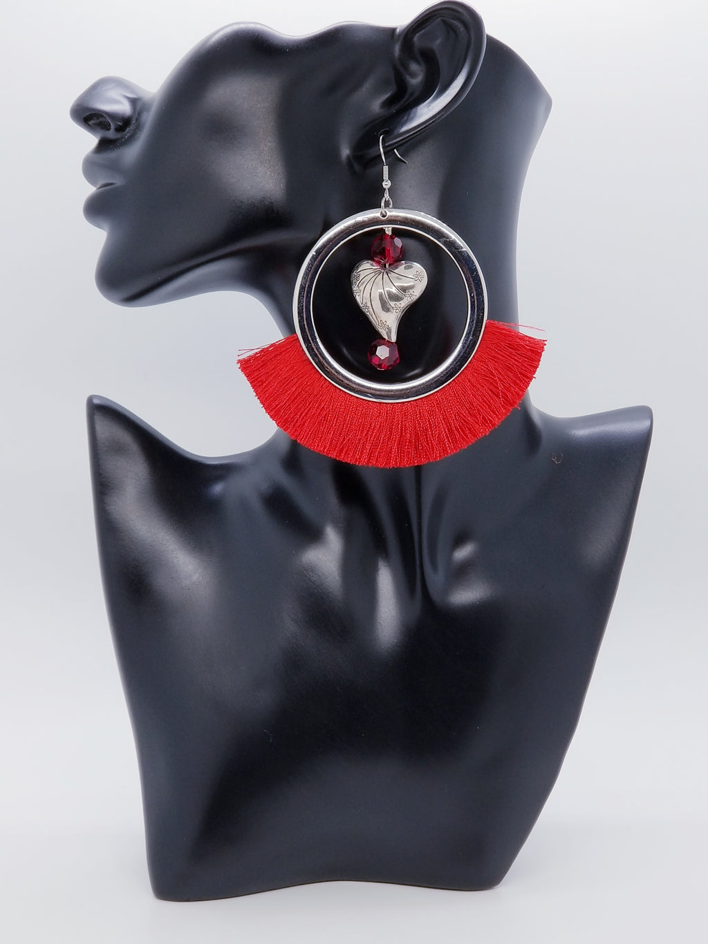 Length: 4 inches | Weight: 1.8 ounces  Designed just for you! The earrings are handmade using   red fringe silver circle charms, silver ornate heart, 10mm red faceted glass beads, silver head pins, and hypoallergenic hooks with back closures. 