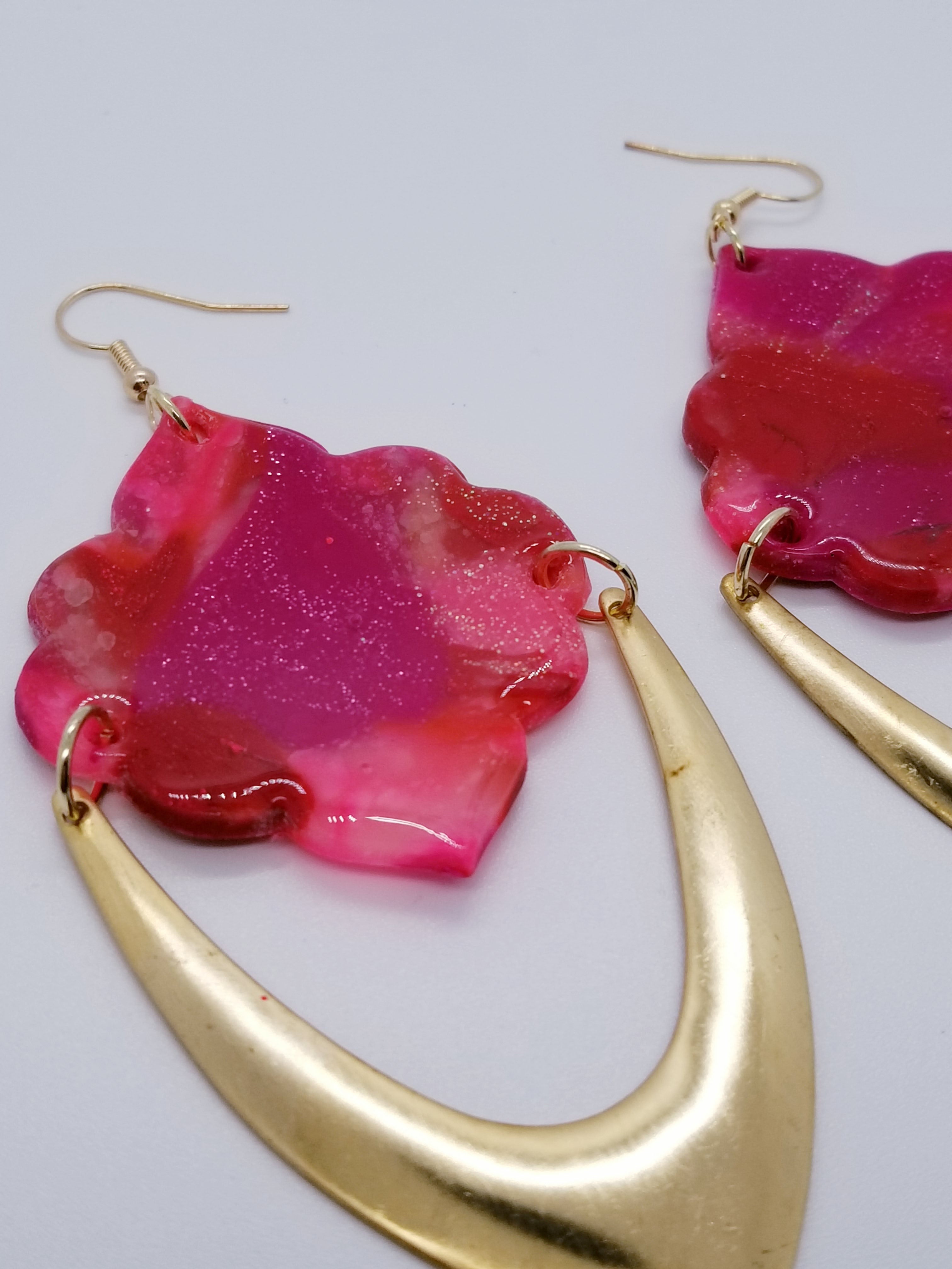 Length: 3.5 inches | Weight: 0.7 ounces   Designed just for you! The earrings are handmade using red pink and swirl gold resin scalloped design, gold arch charm, gold jump rings, gold head pins, and hypoallergenic hooks with back closures. 
