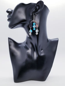 Length: 3 inches | Weight: 0.6 ounces  Designed just for you! The earrings are handmade using speckled black and aqua matte beads, aqua pave ball spacers, silver u-shaped charm, silver metal beads, silver head pins, and hypoallergenic hooks with back closures. 