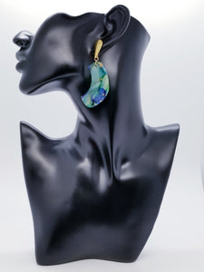 Length: 3 inches | Weight: 0.6 ounces  Designed just for you! The earrings are handmade using green blue swirl gold resin design, gold charm with hypoallergenic posts with back closures.