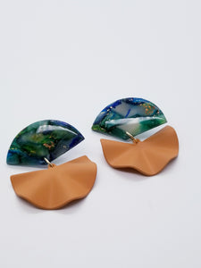Length: 3 inches | Weight: 0.6 ounces  Designed just for you! The earrings are handmade using blue and green gold swirl resin design, matte cognac fan charm, and hypoallergenic hooks with back closures. 