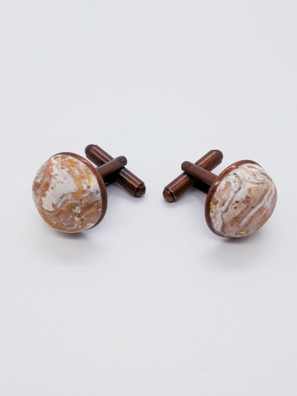 Length: 1 inches | Weight: 0.3 ounces  Designed just for you! The copper brushed cufflinks cuff button gold tan swirl polymer clay Cabochon design. Metal is high polish finish and plating, stylish simple design, comfortable to wear, and  fits well. 