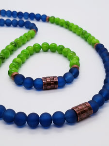 Bracelet: Length- 7.75 inches | Weight: 1 ounce  Necklace: Length- 31 inches | 3.7 ounces  Distinctly You! This necklace and bracelet set is handmade using 10mm navy matte beads, 10mm lime green beads, copper Czech beads, cooper waffle spacer beads, necklace uses metal cord, and bracelet uses 8mm latex free clear stretch cord.