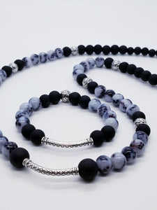 Bracelet: Length- 7.5 inches (both) | Weight- 0.9 ounces  Necklace: Length- 30 inches | Weight- 3.6 ounces  Distinctly You! This bracelet is handmade using 10mm snake pattern glass round beads, 12mm glass smooth black beads, 10mm black glass round beads, 8mm black glass beads, necklace uses metal cord, and bracelet uses 8mm latex free clear stretch cord.