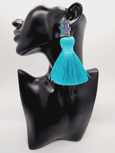 Length: 4.5 inches | Weight: 2.3 ounces (earlobe supports provided due to weight)  Distinctly You! These handmade earrings are made using rose gold (turquoise and cobalt blue rhinestone) stud. turquoise silk tassels, and hypoallergenic hooks with back closures. 