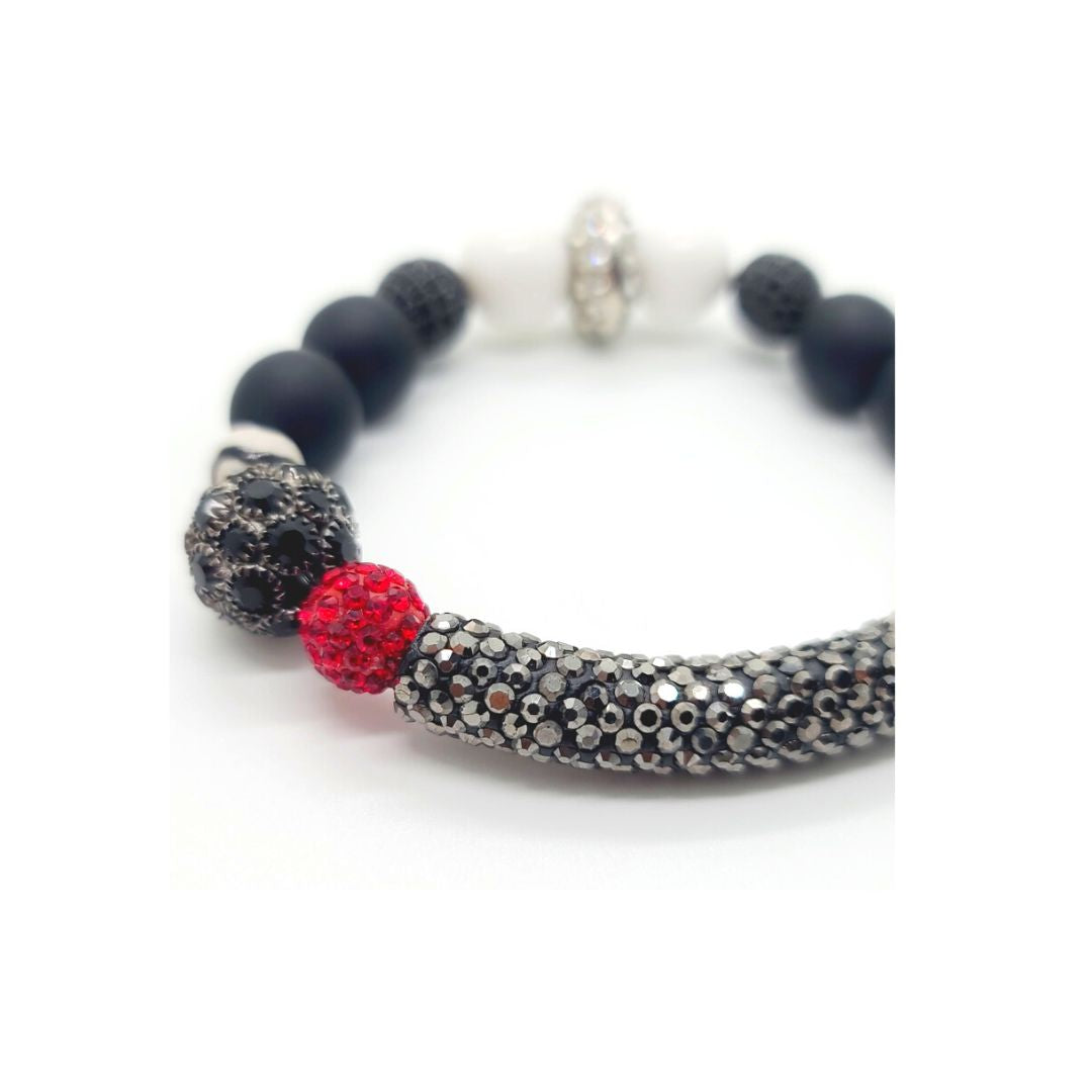 Length: 7.5 inches | Weight: 1.2 ounces  Distinctly You! This bracelet is handmade using black pave charm, pave black beads, pave red beads, black beads, zebra beads, and white glass beads, and bracelet uses 8mm latex free clear stretch cord. 